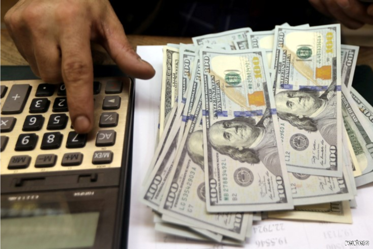 Dollar near eight-month low ahead of central bank meetings